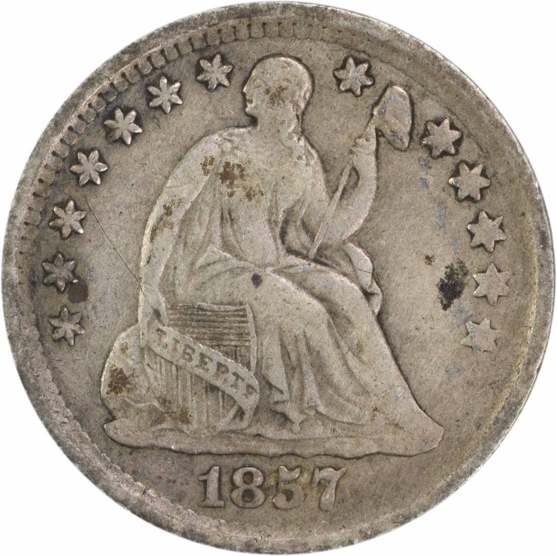 1857 Liberty Seated Half Dime Uncertified 90% Silver Coin: 1857 Liberty Seated Half Dime Uncertified 90% Silver Coin This 1857 Liberty Seated Silver Half Dime is a captivating piece for any coin collector. Struck in Philadelphia, this coin features a beautifu