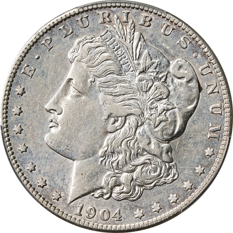 1904-S Morgan Silver Dollar PCGS AU Detail Key Date Silver Coin: 1904-S Morgan Silver Dollar PCGS AU Detail Key Date Silver Coin This 1904-S Morgan Silver Dollar is a key date coin that exhibits outstanding eye appeal, showcasing nice luster and a strong strike. It