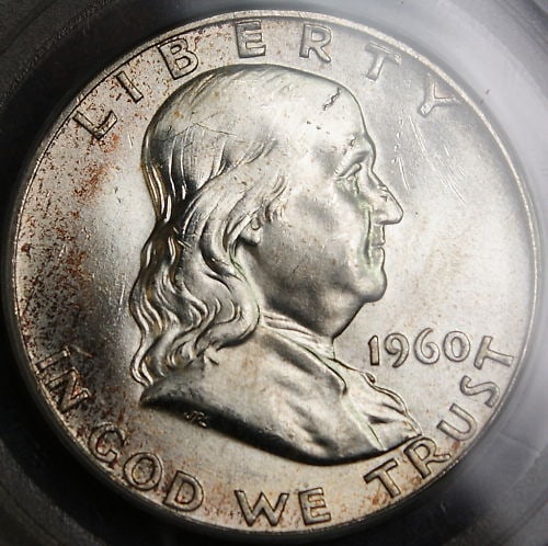 PCGS MS-64 1960 Franklin Silver Half Dollar Philadelphia Toned: PCGS MS-64 1960 Franklin Silver Half Dollar Philadelphia Toned This is a 1960 Franklin silver half dollar struck at the Philadelphia mint, certified by PCGS with a grade of MS-64. The coin features at