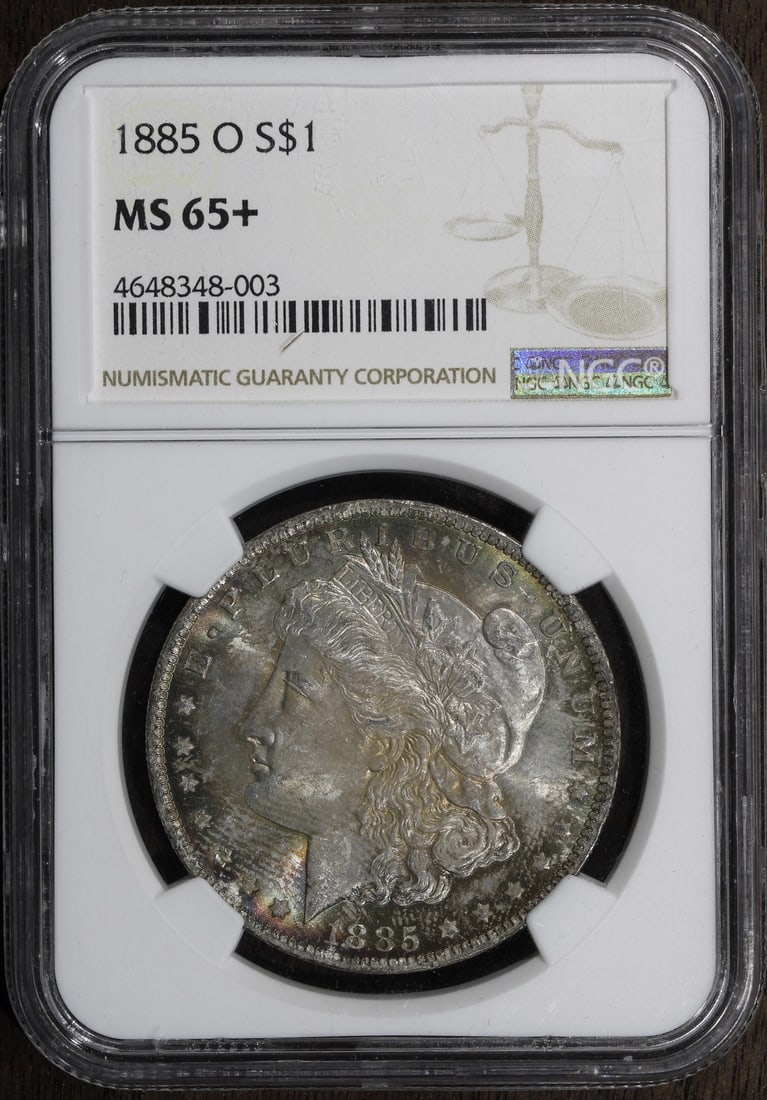 1885-O NGC MS65+ Morgan Silver Dollar Rainbow Toned Coin (1 of 4)