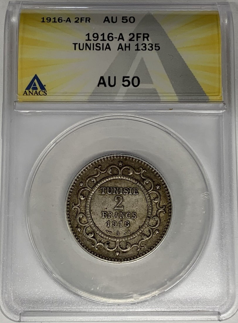 ANACS AU 50 Certified Tunisia 1916-A 2 Francs Coin: ANACS AU 50 Certified Tunisia 1916-A 2 Francs Coin This is a 1916-A Tunisia 2 Francs coin, certified by ANACS with a grade of AU 50. The coin dates to AH 1335 and is from Tunisia. It is a pre-owned co