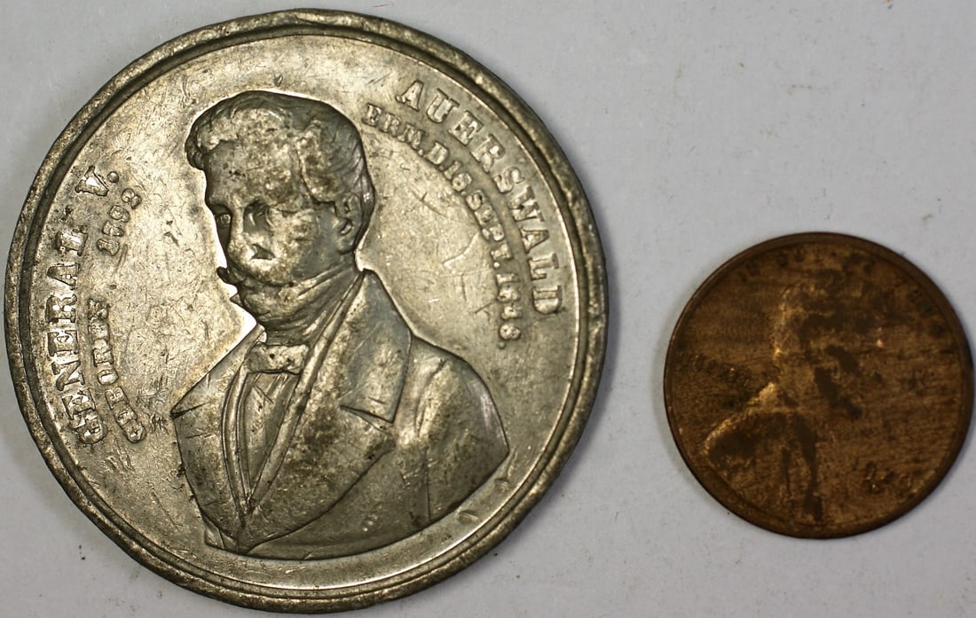 German Pewter Death Angel Medal Featuring General V Auerswald 1792-1848: German Pewter Death Angel Medal Featuring General V Auerswald 1792-1848 This is a German pewter medal featuring an angel motif, associated with General V Auerswald and dating from 1792-1848. The medal