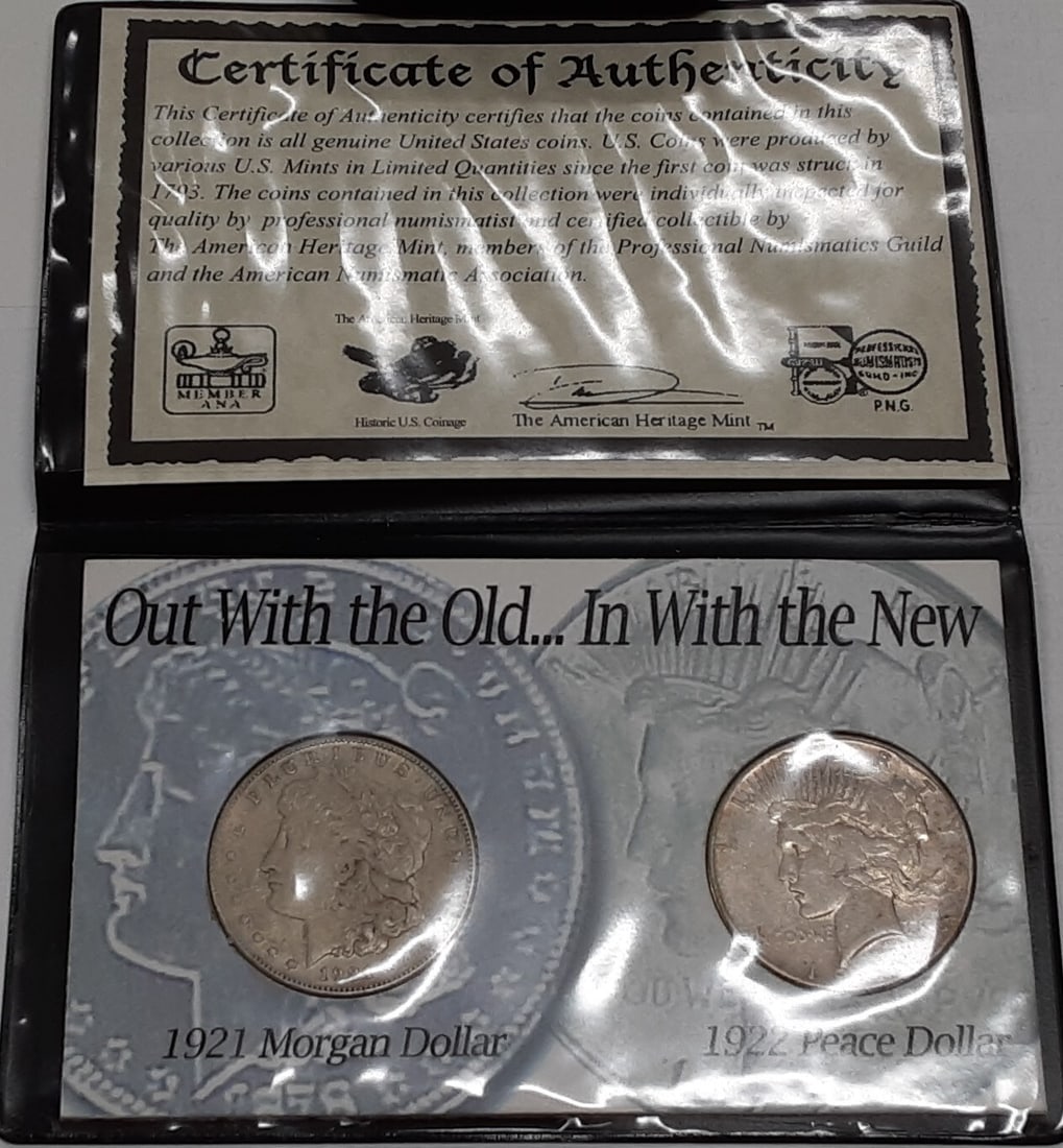 Two Coin US Silver Dollar Collection 1921 Morgan and 1922 Peace in Presentation Folder: Two Coin US Silver Dollar Collection 1921 Morgan and 1922 Peace in Presentation Folder This set includes a 1921-S Morgan Silver Dollar and a 1922-S Peace Silver Dollar, both circulated and housed in a