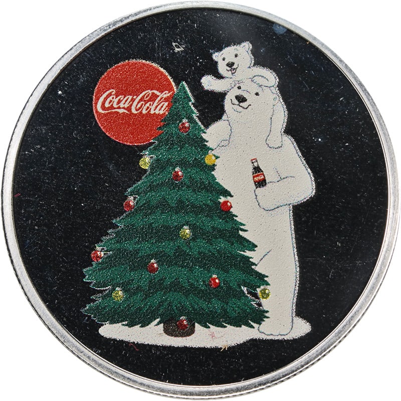 Coca-Cola Polar Bear Proof Silver 1 oz Holiday Ornament Round: Coca-Cola Polar Bear Proof Silver 1 oz Holiday Ornament Round This 1 ounce silver Coca-Cola Polar Bear Christmas ornament features a proof-grade finish and is crafted from 0.999 fine silver. The ornam