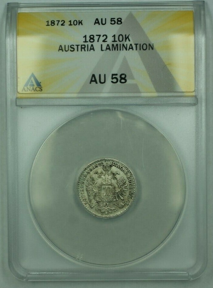 ANACS AU-58 Austria 10 Kreuzer Coin 1872 Lamination: ANACS AU-58 Austria 10 Kreuzer Coin 1872 Lamination This 1872 Austria 10 Kreuzer coin has been certified by ANACS with a grade of AU-58 and features a lamination. It is a pre-owned coin from Austria,
