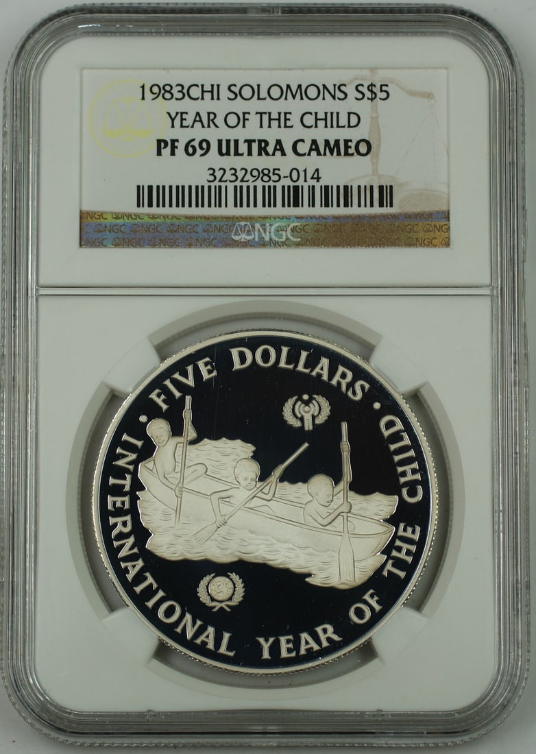 Year of the Child 1983 Solomon Islands Silver 5 Dollar NGC PF-69 Proof Coin: Year of the Child 1983 Solomon Islands Silver 5 Dollar NGC PF-69 Proof Coin This is a 1983 Solomon Islands 5 Dollar proof coin commemorating the Year of the Child. Struck at the Valcambi Mint in Switz