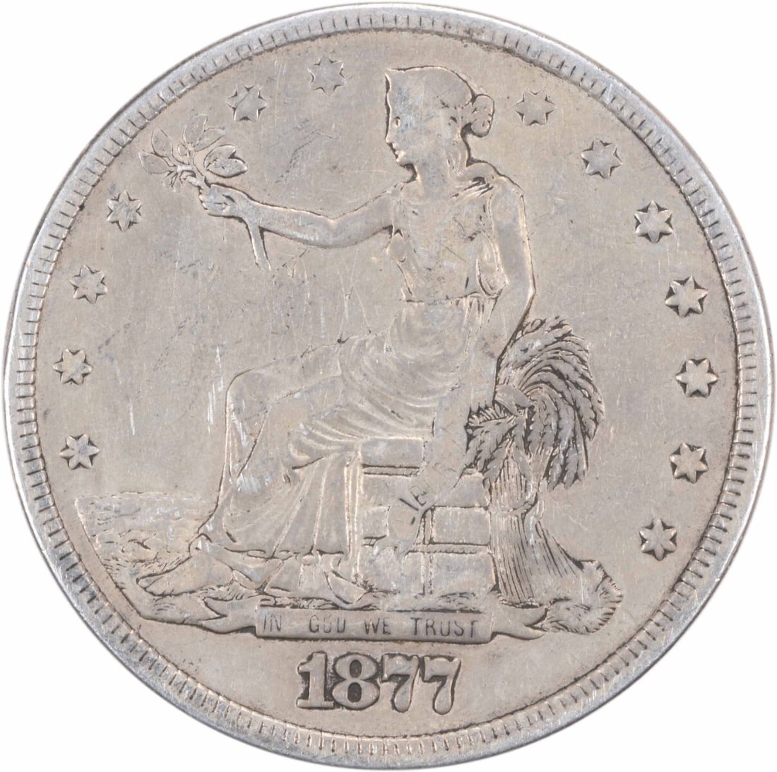 1877 Trade Silver Dollar F William Barber Design Uncertified: 1877 Trade Silver Dollar F William Barber Design Uncertified This 1877 Trade Silver Dollar is a remarkable piece of history, featuring a classic design by William Barber. Struck in Philadelphia, this