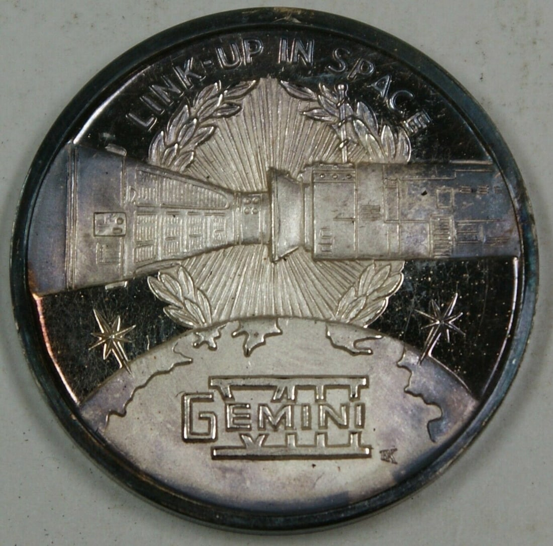 Gemini 8 Silver Commemorative Medal by International Mint Honoring Space Mission: Gemini 8 Silver Commemorative Medal by International Mint Honoring Space Mission This Gemini 8 commemorative silver medal honors the history of American men in space. The reverse side features images