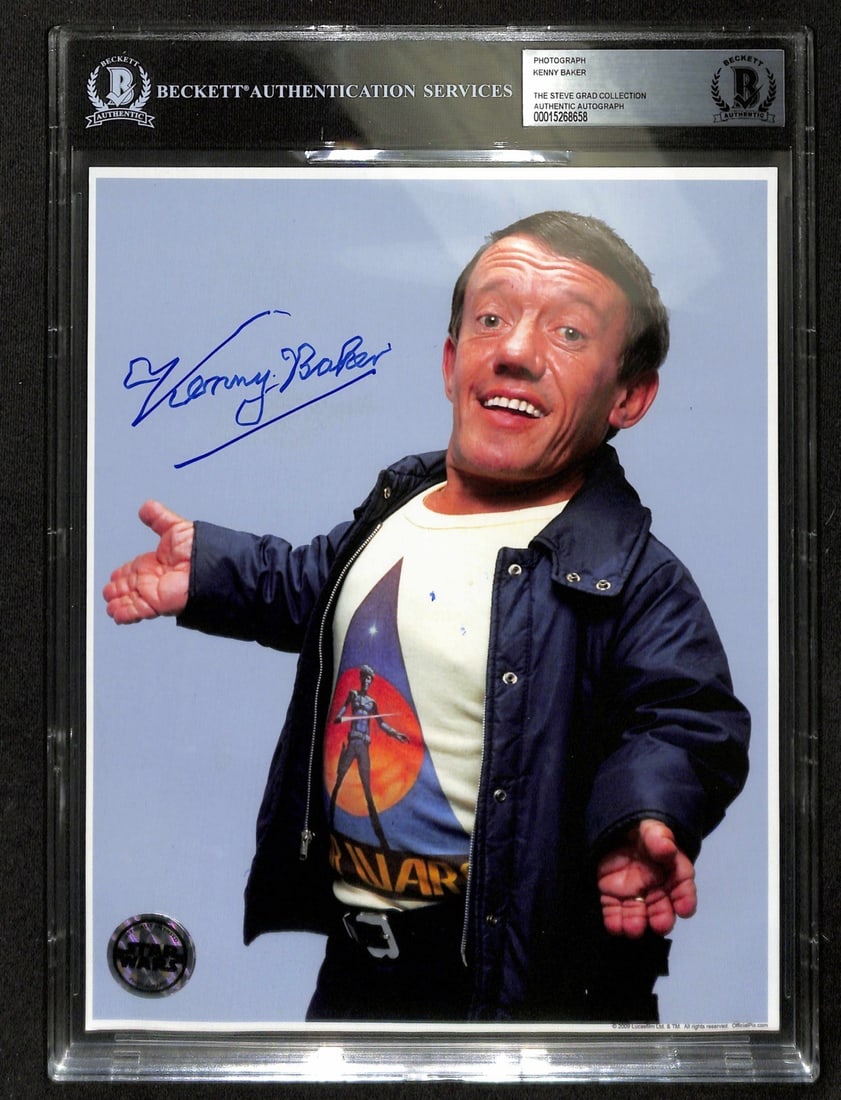 Kenny Baker Signed R2-D2 Star Wars 8x10 Photo Beckett Authenticated: Kenny Baker Signed R2-D2 Star Wars 8x10 Photo Beckett Authenticated This signed 8x10 color photograph features R2-D2, beautifully autographed in blue permanent marker by Kenny Baker, who portrayed the