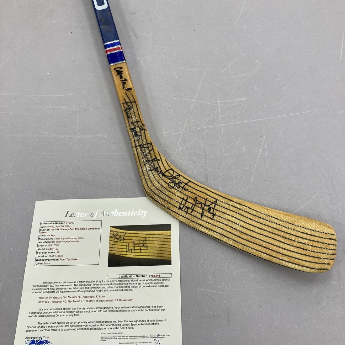 1987-88 Edmonton Oilers Team Signed Hockey Stick Wayne Gretzky JSA Authenticated: 1987-88 Edmonton Oilers Team Signed Hockey Stick Wayne Gretzky JSA Authenticated Celebrate the legendary 1987-88 Edmonton Oilers Stanley Cup Championship with this team signed Sher-Wood hockey stick.