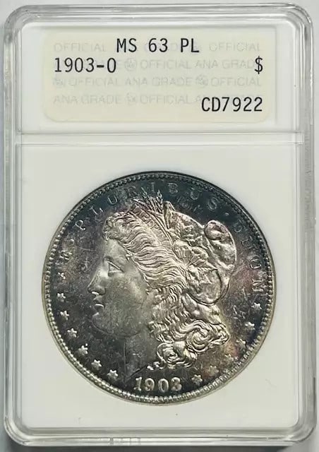 1903 O Morgan Silver Dollar ANACS MS-63 PL Certified Uncirculated: 1903 O Morgan Silver Dollar ANACS MS-63 PL Certified Uncirculated This 1903 O Morgan Silver Dollar is a stunning example of numismatic artistry, certified by ANACS with a grade of MS 63. It features a