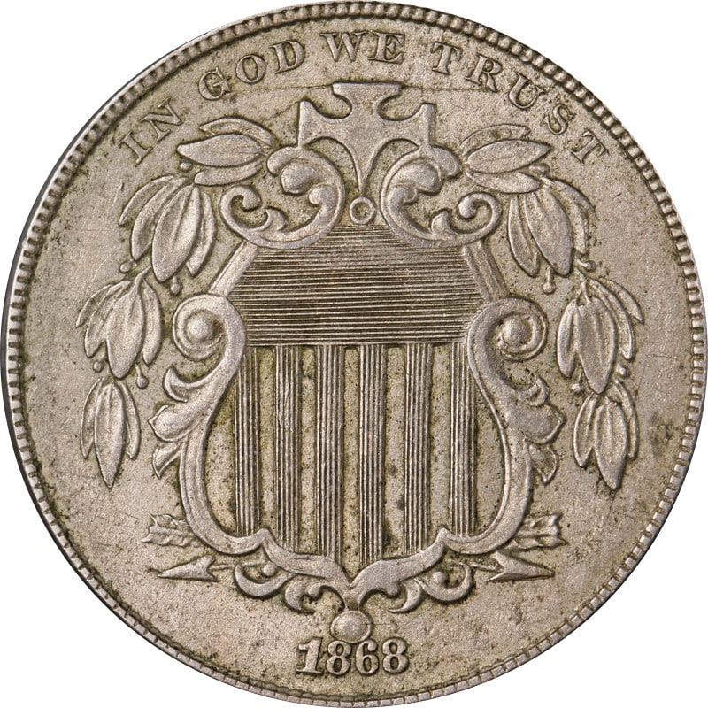 United States 1868 Nickel Five Cent Shield Design Coin Circulated: United States 1868 Nickel Five Cent Shield Design Coin Circulated This is an 1868 Shield Nickel from the United States. The coin is composed of nickel and is in circulated, pre-owned condition. It is