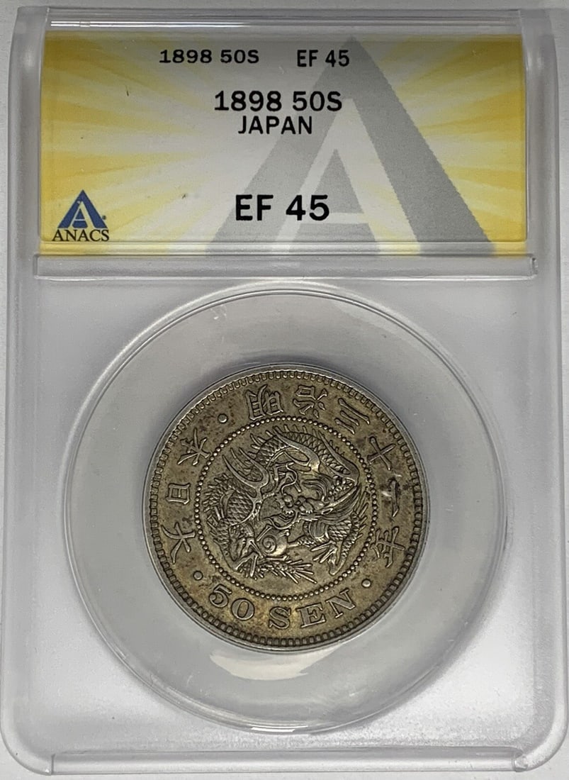1898 Japanese 50 Sen ANACS Graded XF 45 Silver Coin: 1898 Japanese 50 Sen ANACS Graded XF 45 Silver Coin This is a 50 Sen coin from Japan dated 1898. The coin has been graded XF 45 by ANACS, indicating it is in extra fine condition and has been circulat