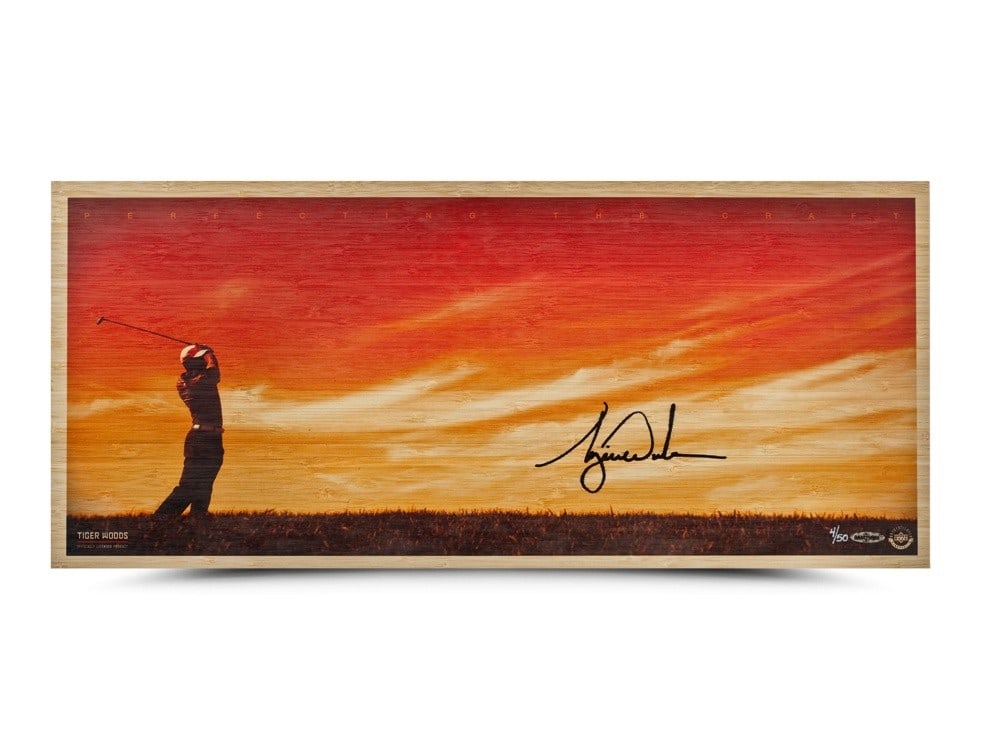 Tiger Woods Autographed Limited Edition Bamboo Photo 26x11 /50: Tiger Woods Autographed Limited Edition Bamboo Photo 26x11 /50 This limited edition, original signed photo of Tiger Woods showcases the legendary golfer in action, titled "Perfecting the Craft." Measu