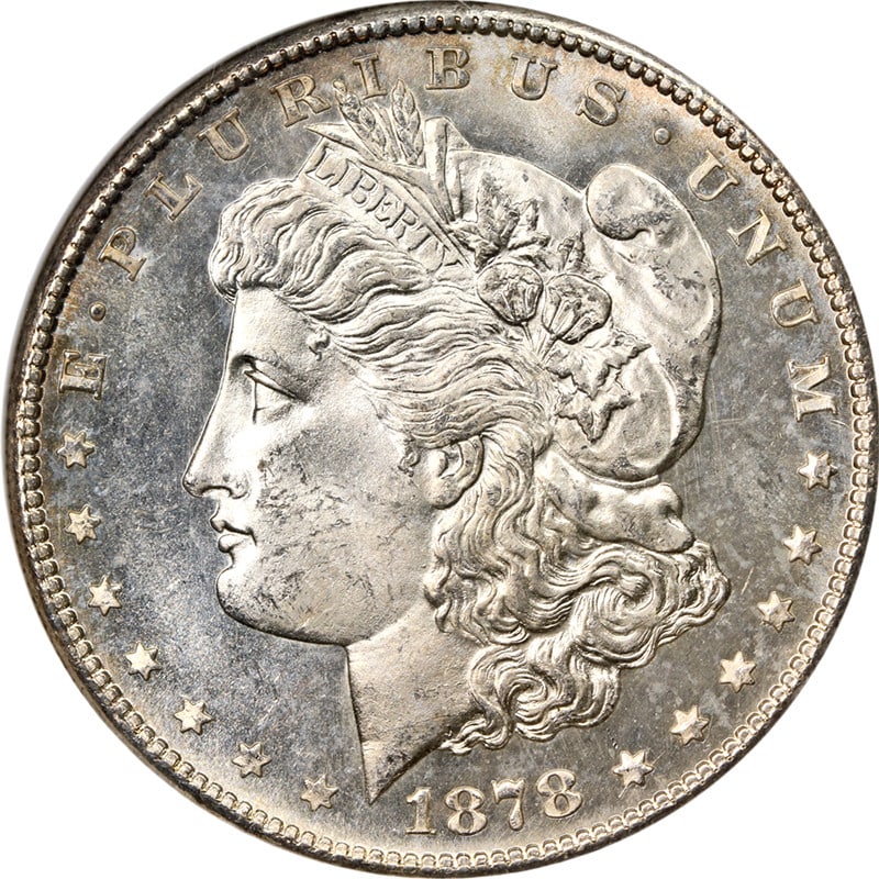 1878-S Morgan Silver Dollar NGC MS64 Blast White Uncirculated Coin: 1878-S Morgan Silver Dollar NGC MS64 Blast White Uncirculated Coin This stunning 1878-S Morgan Silver Dollar is certified by NGC with a grade of MS64, showcasing exceptional eye appeal, fantastic lust