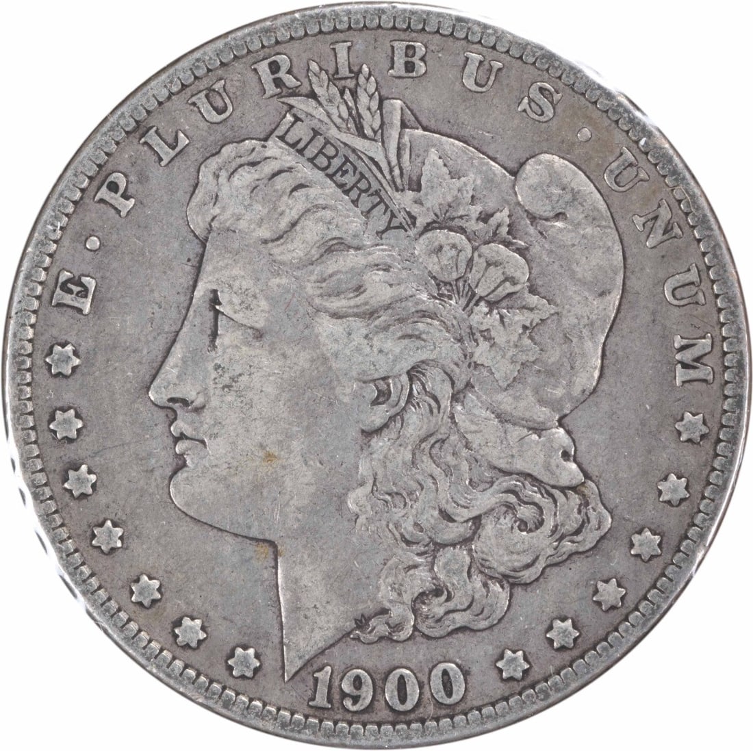1900-O Morgan Silver Dollar Coin by George T. Morgan VF Uncertified: 1900-O Morgan Silver Dollar Coin by George T. Morgan VF Uncertified This 1900-O/CC Morgan Silver Dollar is a remarkable piece of history, exhibiting a Very Fine (VF) grade. Struck at the New Orleans m