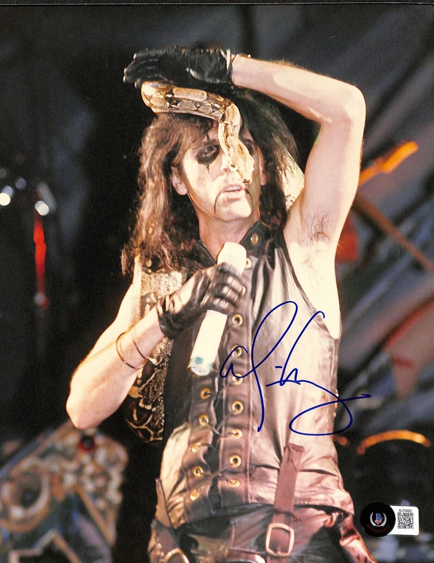 Signed 8x10 Photo of Alice Cooper with Beckett Authentication: Signed 8x10 Photo of Alice Cooper with Beckett Authentication This is an original 8x10 photograph signed by music legend Alice Cooper in blue permanent marker. The autograph has been authenticated by