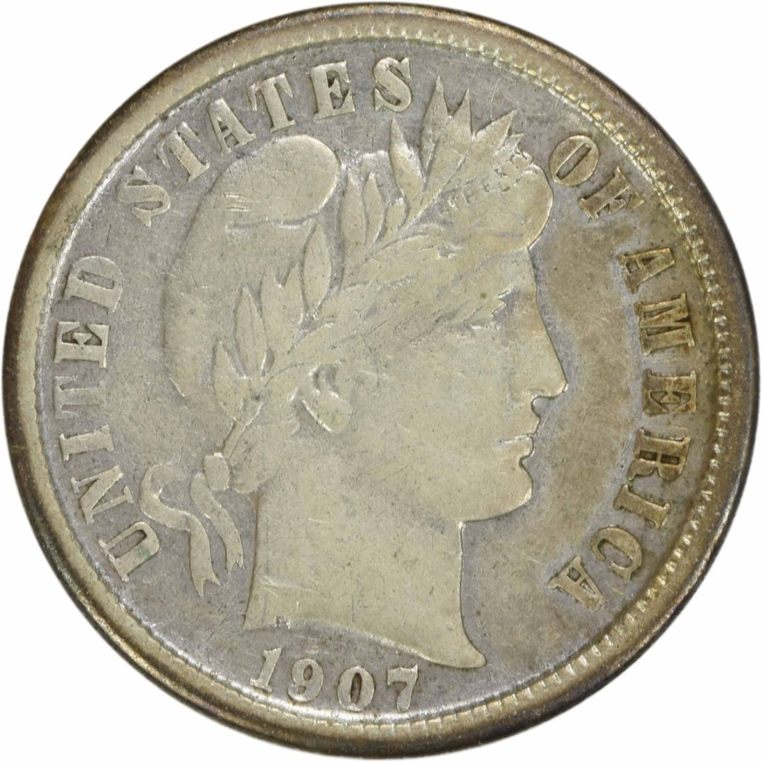 1907-O Barber Silver Dime 10C VF Uncertified 90% Silver: 1907-O Barber Silver Dime 10C VF Uncertified 90% Silver This 1907-O Barber Silver Dime is a beautifully detailed coin featuring the iconic design by Charles E. Barber. Struck at the New Orleans Mint,
