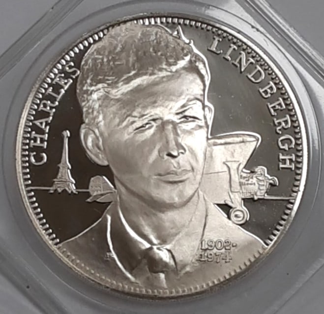 1975 Charles Lindbergh Tribute Proof Medal in .925 Silver by Franklin Mint: 1975 Charles Lindbergh Tribute Proof Medal in .925 Silver by Franklin Mint This 1975 Franklin Mint proof silver medal is a tribute to Charles A. Lindbergh, the renowned American aviator. Struck in the
