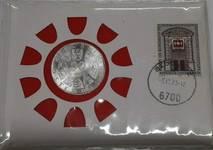 Austria 1973 Silver 50 Schilling Dr. Korner Coin and Stamp First Day Cover: Austria 1973 Silver 50 Schilling Dr. Korner Coin and Stamp First Day Cover This is a 1973 Austria 50 Schilling coin made of 90% silver presented in a First Day Cover (FDC) alongside an Austrian stamp.