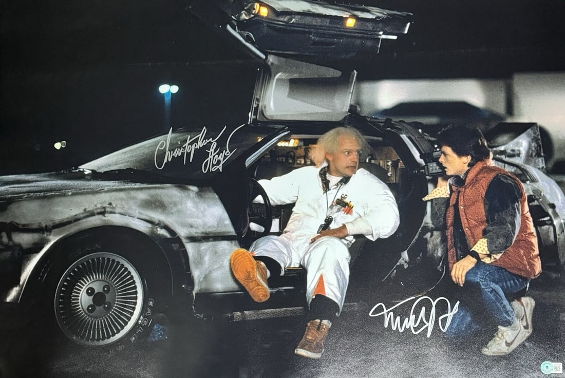 Back To The Future Signed 20x30 Photo by Lloyd & Fox Beckett LOA: Back To The Future Signed 20x30 Photo by Lloyd & Fox Beckett LOA This is an autographed 20x30 color photograph featuring the iconic duo, Michael J. Fox and Christopher Lloyd, from the beloved film Bac