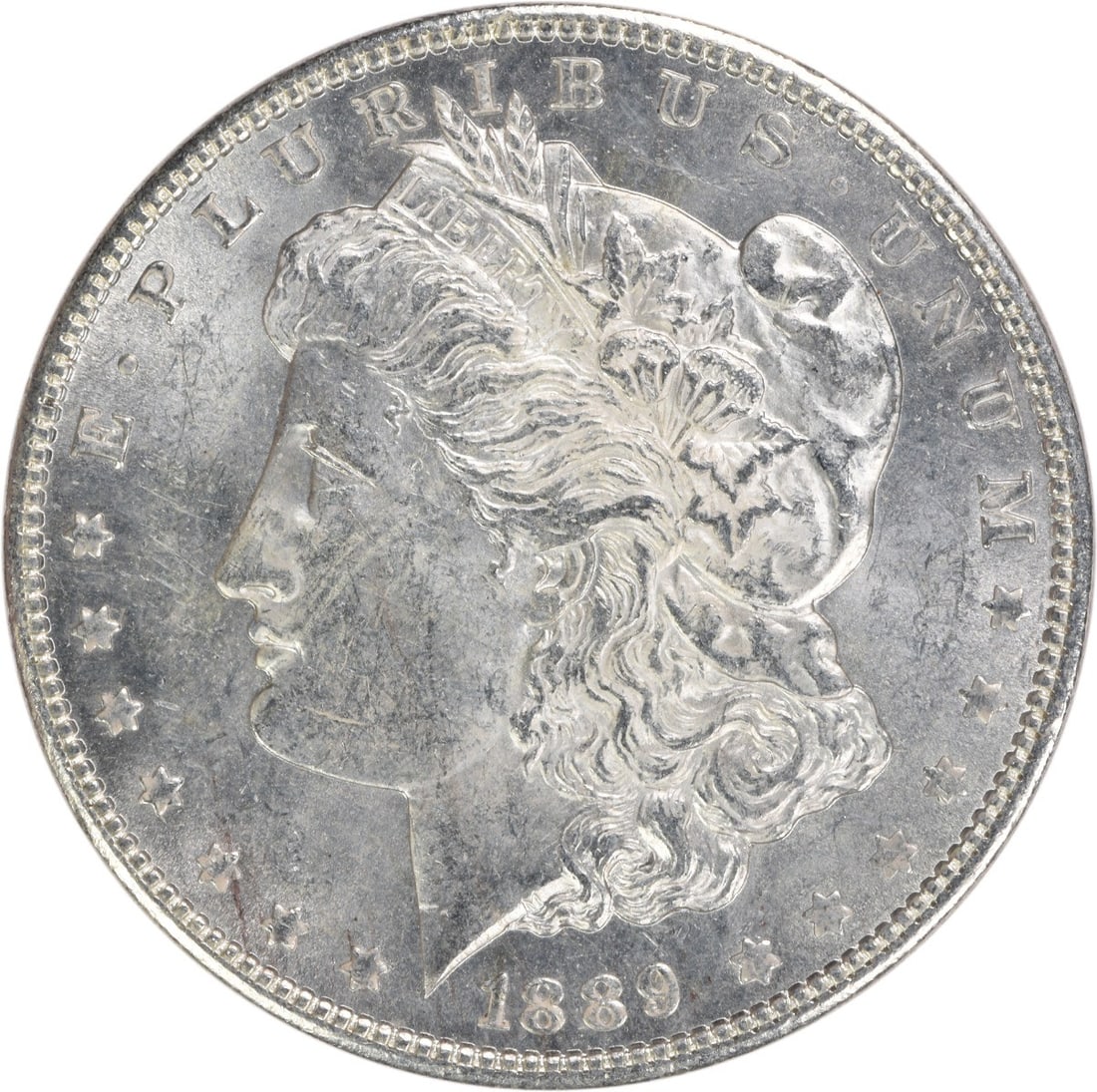 1889 Morgan Silver Dollar Choice BU Uncertified Silver Coin: 1889 Morgan Silver Dollar Choice BU Uncertified Silver Coin This 1889 Morgan Silver Dollar is a stunning representation of American numismatic history. It is classified as Choice Brilliant Uncirculate