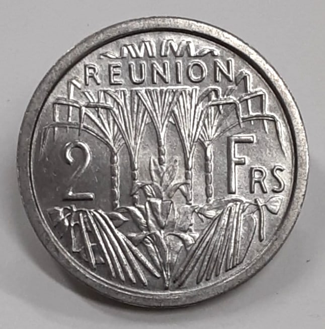 Roll of 30 Uncirculated 1948 Reunion 2 Francs Aluminum Coins KM 8: Roll of 30 Uncirculated 1948 Reunion 2 Francs Aluminum Coins KM 8 This is a roll of 30 un-used 2 Francs coins from Reunion, dated 1948. Each coin is composed of aluminum and features the KM#8 designat