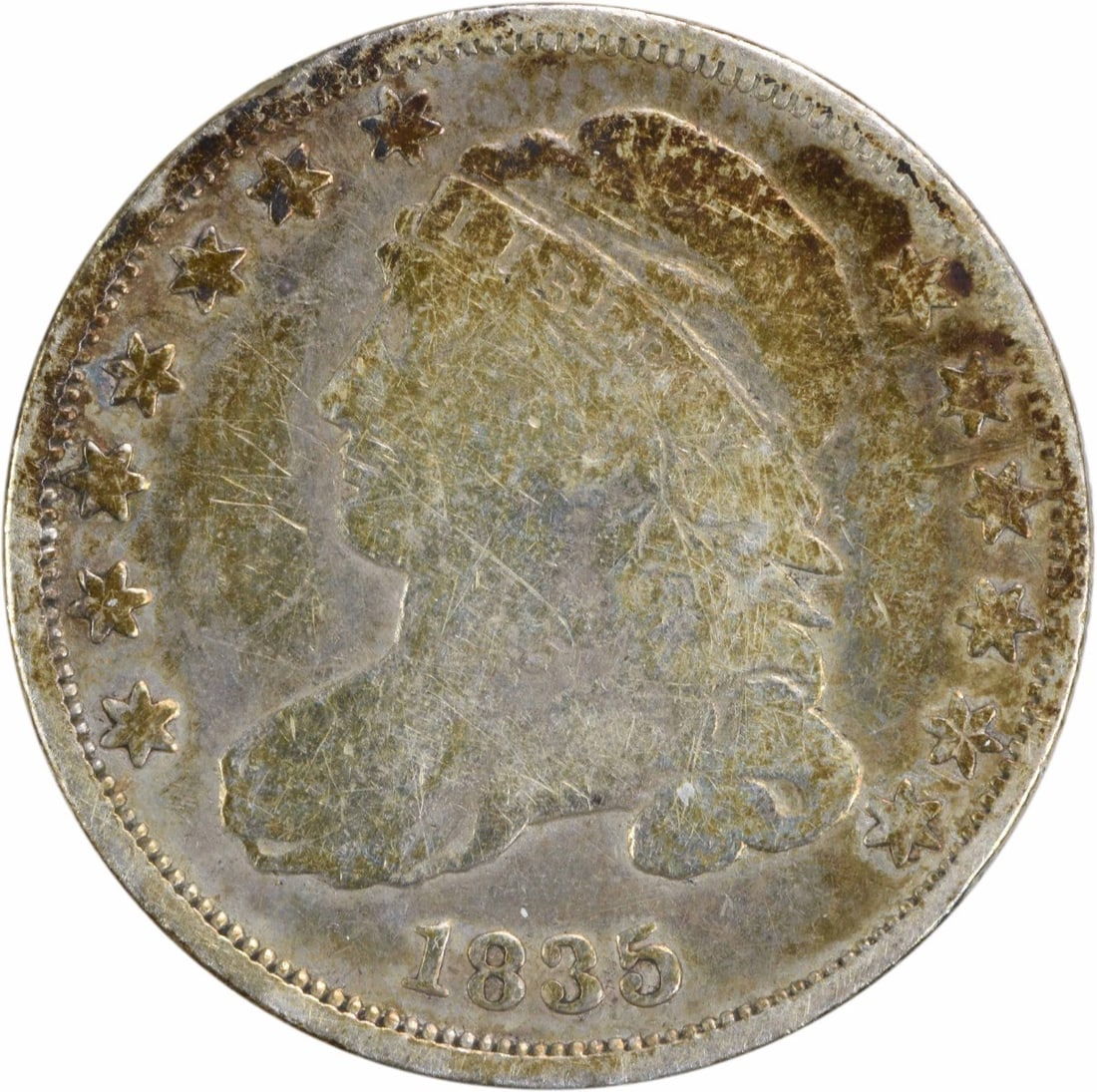 1835 Capped Bust Silver Dime 10C Philadelphia Uncertified: 1835 Capped Bust Silver Dime 10C Philadelphia Uncertified This 1835 Bust Silver Dime is a captivating piece of numismatic history. Featuring a Capped Bust design by John Reich, this coin showcases its