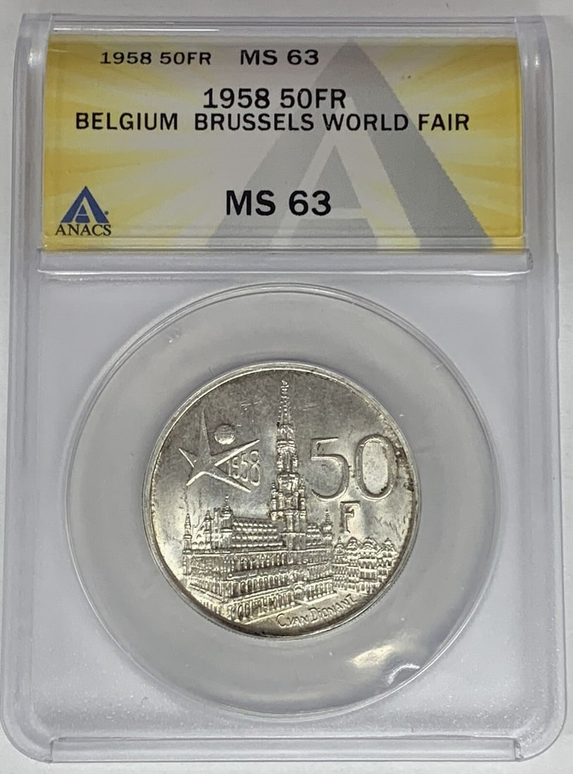 1958 Silver 50 Francs Belgium Coin ANACS MS 63 World Fair Issue: 1958 Silver 50 Francs Belgium Coin ANACS MS 63 World Fair Issue This 1958 Belgium 50 Francs coin commemorates the World Fair and is composed of silver. The coin has been graded MS 63 by ANACS, indicat