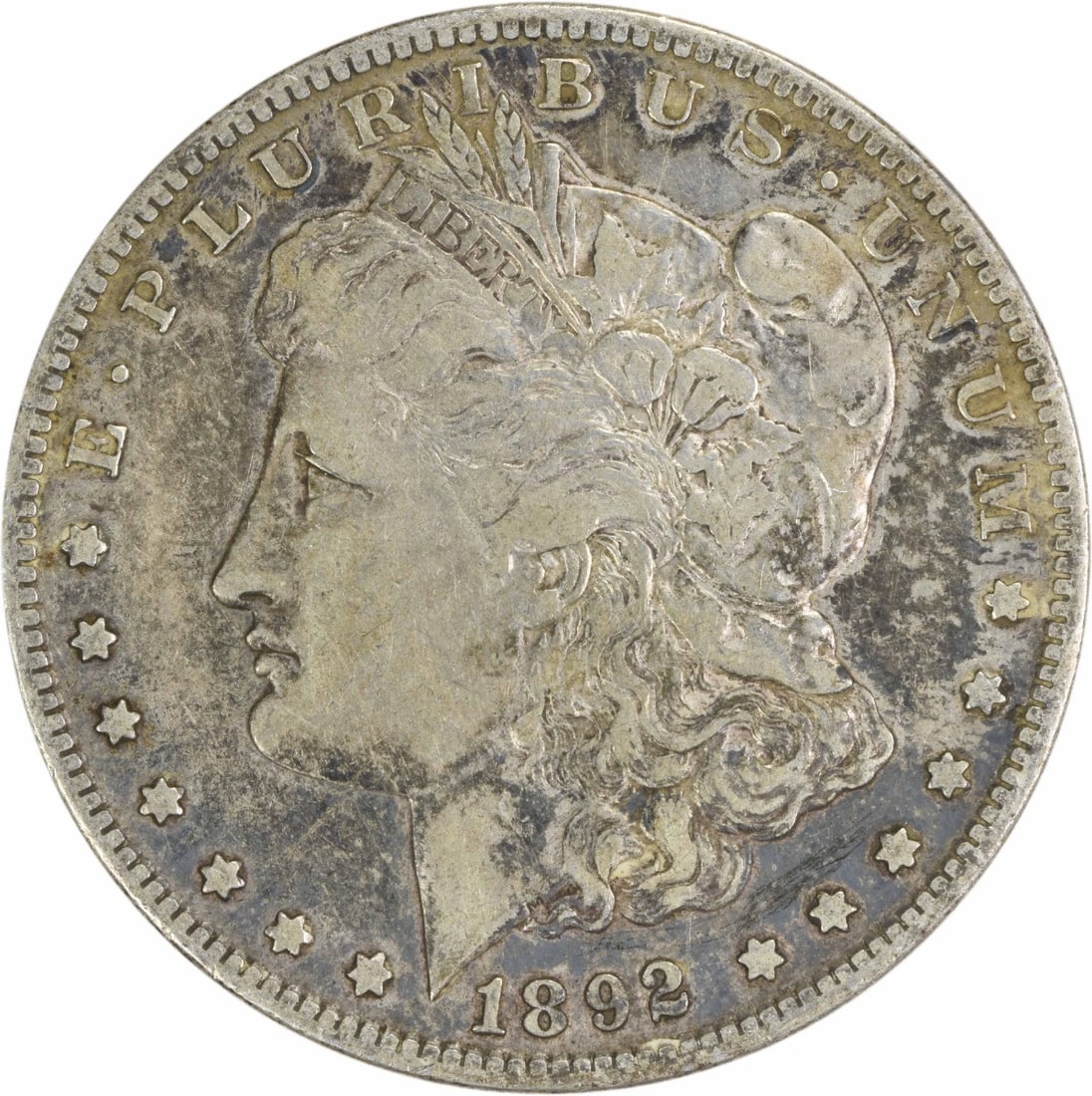 1892-S Morgan Silver Dollar VF San Francisco Uncertified Coin: 1892-S Morgan Silver Dollar VF San Francisco Uncertified Coin This 1892-S Morgan Silver Dollar is a classic piece of American numismatics, showcasing the artistry of designer George T. Morgan. The coi