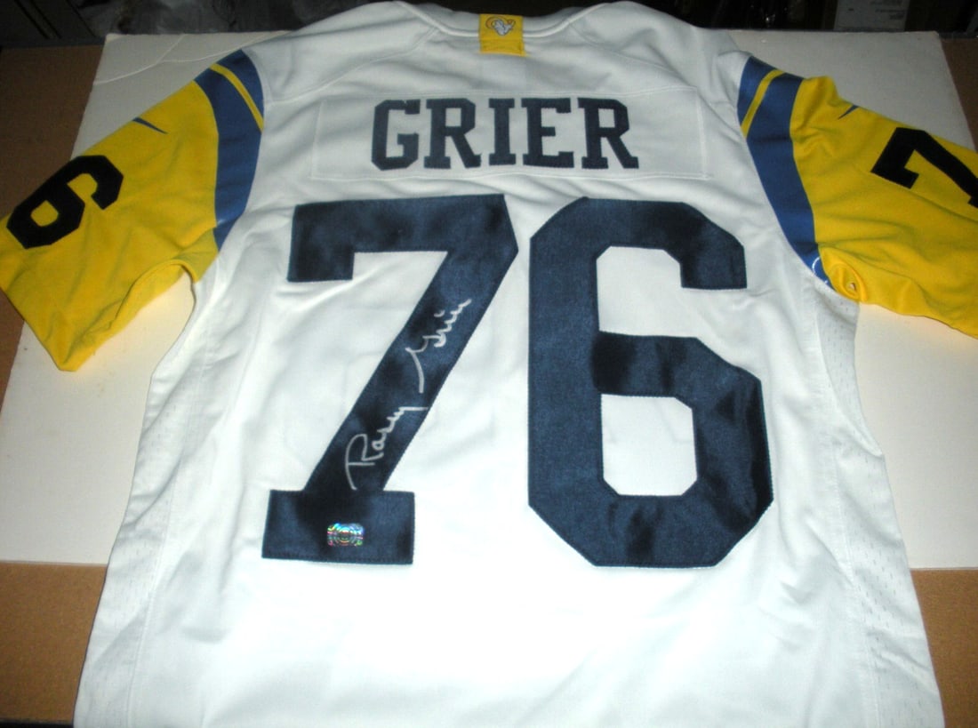 Rosey Grier Signed Los Angeles Rams Official Nike Jersey with COA: Rosey Grier Signed Los Angeles Rams Official Nike Jersey with COA This officially licensed Nike jersey features the iconic Los Angeles Rams design and is personally signed by Rosey Grier, making it a