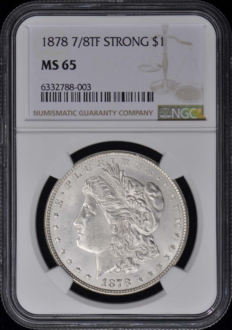 NGC MS65 1878 Morgan Silver Dollar 7/8 Tailfeathers Strong Variety: NGC MS65 1878 Morgan Silver Dollar 7/8 Tailfeathers Strong Variety This 1878 Morgan Dollar features the rare 7/8 Tail Feathers (Strong) variety and has been certified by NGC with a grade of MS65. Stru