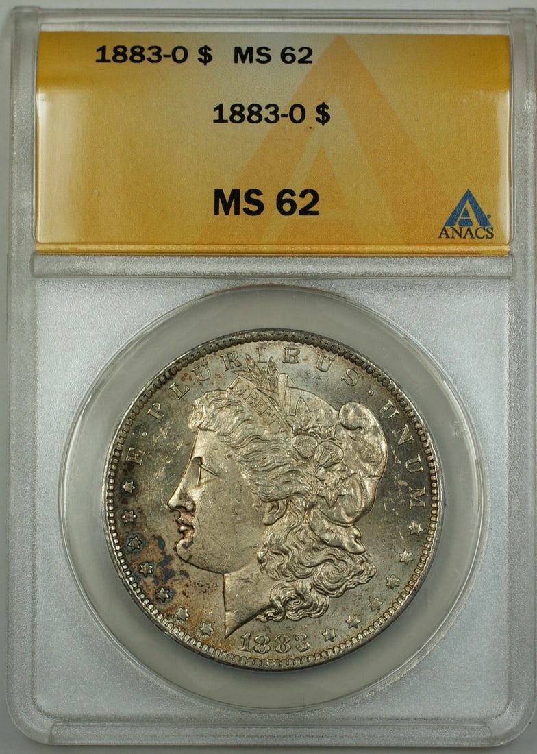 ANACS MS-62 New Orleans Morgan Dollar 1883-O Light Toning Silver $1 Coin: ANACS MS-62 New Orleans Morgan Dollar 1883-O Light Toning Silver $1 Coin This 1883-O Morgan Silver Dollar is graded MS-62 by ANACS and was minted in New Orleans. The coin is composed of silver and dis