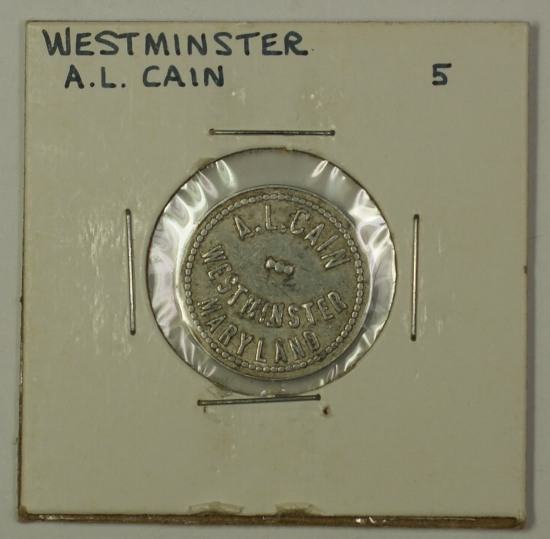 5 Cent A.L. Cain Trade Token Early 20th Century Westminster Maryland: 5 Cent A.L. Cain Trade Token Early 20th Century Westminster Maryland This early 20th-century 5 cent trade token is from A.L. Cain in Carroll County, Westminster, Maryland. It is a collectible piece of