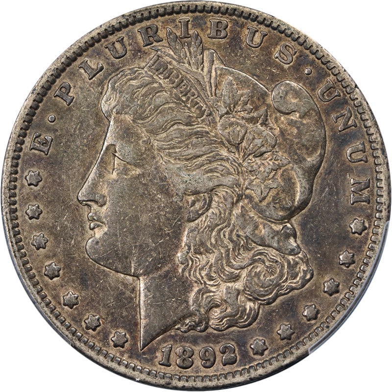 PCGS XF40 1892-CC Morgan Silver Dollar Key Date Collectible Coin: PCGS XF40 1892-CC Morgan Silver Dollar Key Date Collectible Coin This 1892-CC Morgan Silver Dollar is graded XF40 by PCGS and features strong eye appeal with attractive color and surfaces. Struck in C