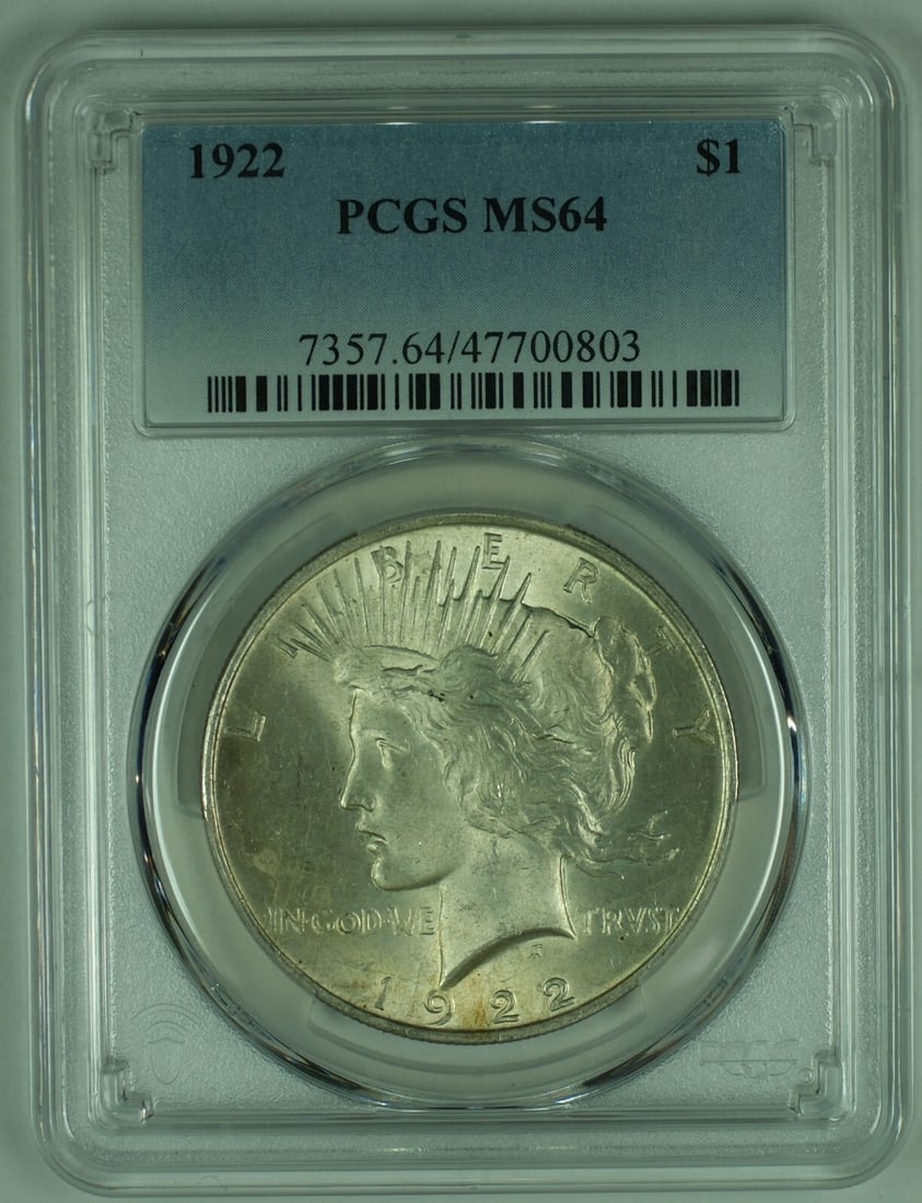 PCGS MS64 1922 Peace Silver Dollar with Toning: PCGS MS64 1922 Peace Silver Dollar with Toning This is a 1922 Peace Silver $1 Dollar coin from the United States. The coin features a toned finish and is composed of silver. It has been certified by