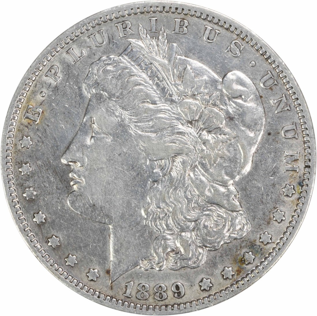 EF 1889 New Orleans Morgan Dollar Uncertified 90 Percent Silver Coin: EF 1889 New Orleans Morgan Dollar Uncertified 90 Percent Silver Coin This 1889-O Morgan Silver Dollar is a circulated coin from the United States, minted in New Orleans. Struck in 90% silver and 10% c