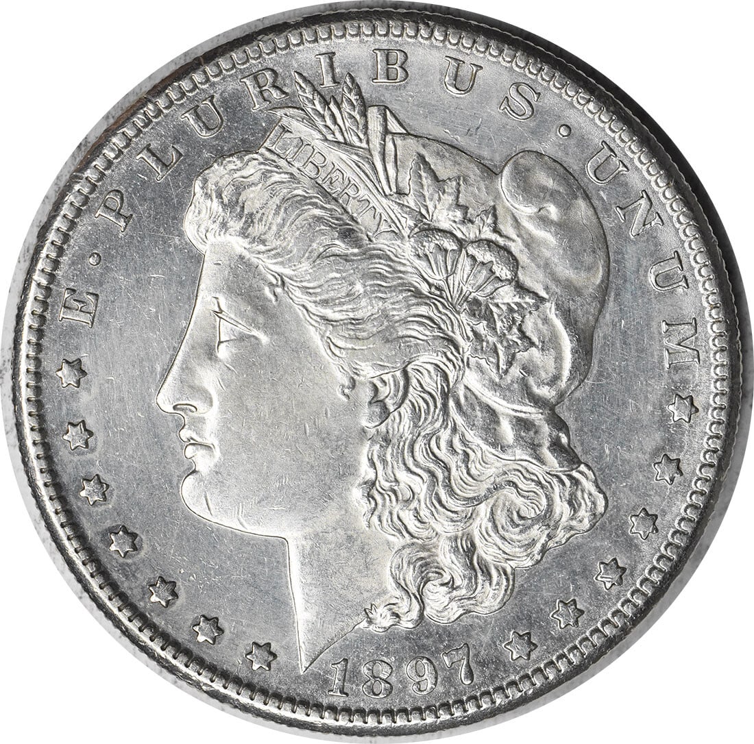 1897-S Morgan Dollar AU Uncertified Silver Coin by George T. Morgan: 1897-S Morgan Dollar AU Uncertified Silver Coin by George T. Morgan This 1897-S Morgan Silver Dollar is a remarkable collectible piece, showcasing the artistry of designer George T. Morgan. It is grad