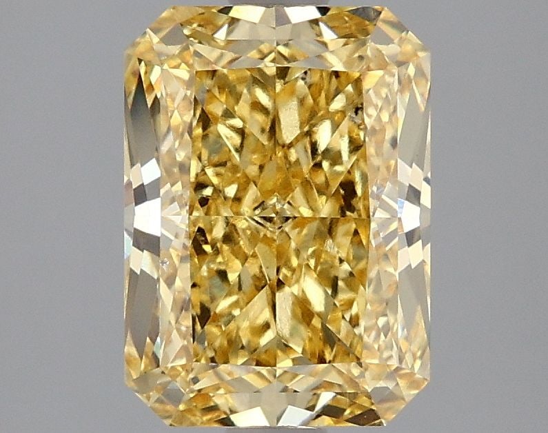 Loose Diamond - RADIANT 2.57ct Fancy Vivid Yellow VS2: Loose Diamond - RADIANT 2.57ct Fancy Vivid Yellow VS2 Source: This is a real non-mined Diamond that has been grown in a lab Shape: RADIANT Carats: 2.57 Color: Fancy Vivid Yellow Certification: IGI Vid