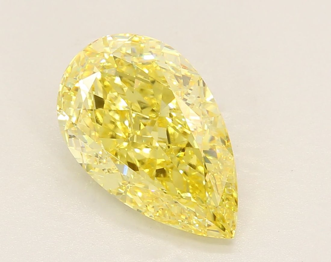 Loose Diamond - PEAR 4.04ct Fancy Vivid Yellow VS1: Loose Diamond - PEAR 4.04ct Fancy Vivid Yellow VS1 Source: This is a real non-mined Diamond that has been grown in a lab Shape: PEAR Carats: 4.04 Color: Fancy Vivid Yellow Certification: IGI Video: