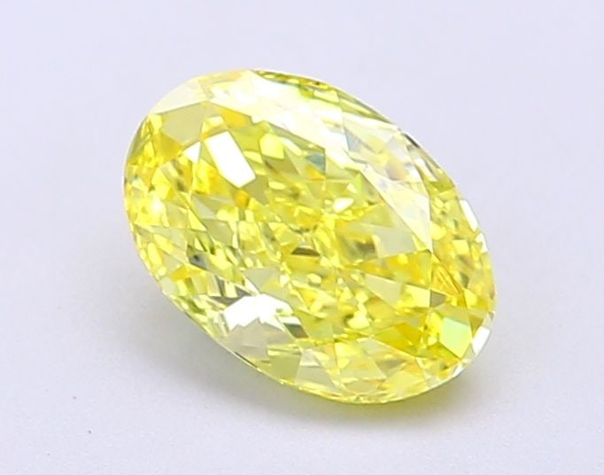Loose Diamond - OVAL 1.01ct Fancy Vivid Yellow VVS1: Loose Diamond - OVAL 1.01ct Fancy Vivid Yellow VVS1 Source: This is a real non-mined Diamond that has been grown in a lab Shape: OVAL Carats: 1.01 Color: Fancy Vivid Yellow Certification: IGI Video: