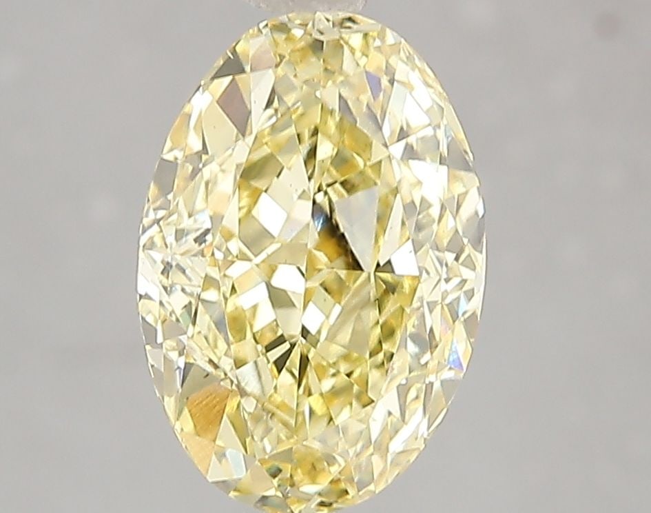 Loose Diamond - OVAL 3.02ct Fancy Vivid Yellow VS2: Loose Diamond - OVAL 3.02ct Fancy Vivid Yellow VS2 Source: This is a real non-mined Diamond that has been grown in a lab Shape: OVAL Carats: 3.02 Color: Fancy Vivid Yellow Certification: IGI Video: