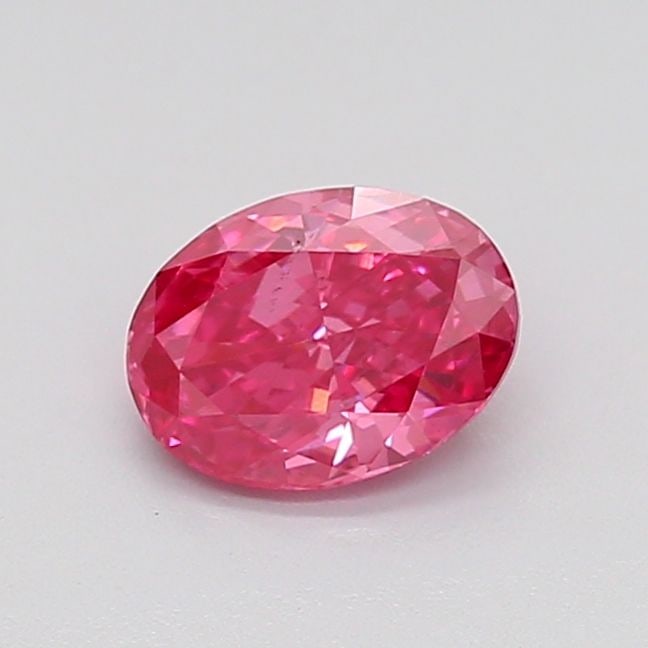 Loose Diamond - OVAL 0.74ct Fancy Vivid Pink VS2: Loose Diamond - OVAL 0.74ct Fancy Vivid Pink VS2 Source: This is a real non-mined Diamond that has been grown in a lab Shape: OVAL Carats: 0.74 Color: Fancy Vivid Pink Certification: IGI Video: