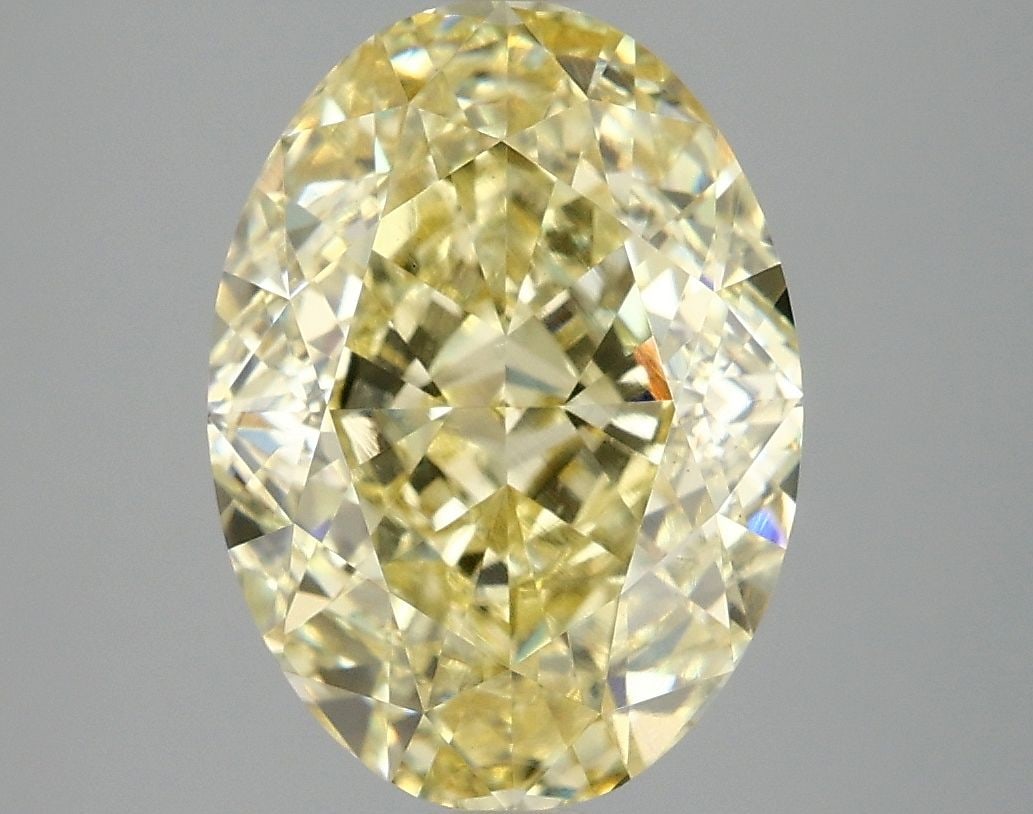 Loose Diamond - OVAL 5.09ct Fancy Intense Yellow VS2: Loose Diamond - OVAL 5.09ct Fancy Intense Yellow VS2 Source: This is a real non-mined Diamond that has been grown in a lab Shape: OVAL Carats: 5.09 Color: Fancy Intense Yellow Certification: IGI Video