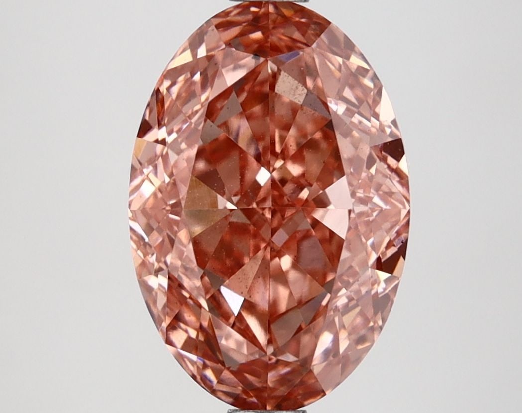 Loose Diamond - OVAL 2.75ct Fancy Vivid Pink VS2: Loose Diamond - OVAL 2.75ct Fancy Vivid Pink VS2 Source: This is a real non-mined Diamond that has been grown in a lab Shape: OVAL Carats: 2.75 Color: Fancy Vivid Pink Certification: IGI Video: