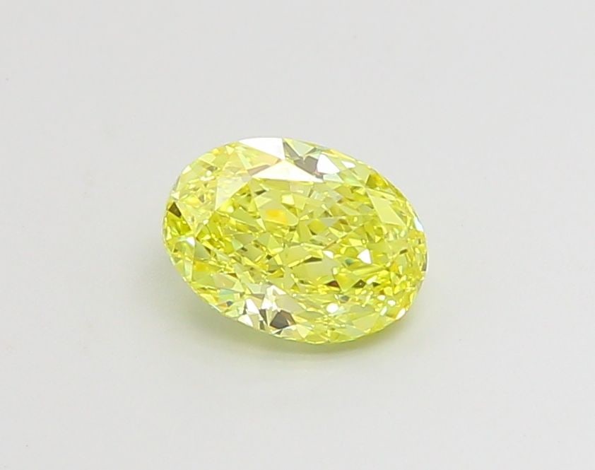 Loose Diamond - OVAL 1.05ct Fancy Vivid Yellow VS2: Loose Diamond - OVAL 1.05ct Fancy Vivid Yellow VS2 Source: This is a real non-mined Diamond that has been grown in a lab Shape: OVAL Carats: 1.05 Color: Fancy Vivid Yellow Certification: IGI Video: