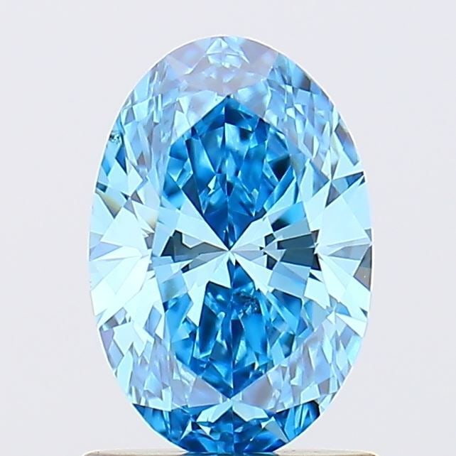 Loose Diamond - OVAL 1.01ct Fancy Vivid Blue VS1: Loose Diamond - OVAL 1.01ct Fancy Vivid Blue VS1 Source: This is a real non-mined Diamond that has been grown in a lab Shape: OVAL Carats: 1.01 Color: Fancy Vivid Blue Certification: IGI Video: