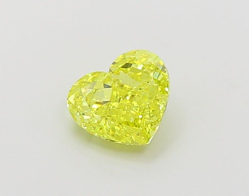 Loose Diamond - HEART 1.01ct Fancy Vivid Yellow VVS2: Loose Diamond - HEART 1.01ct Fancy Vivid Yellow VVS2 Source: This is a real non-mined Diamond that has been grown in a lab Shape: HEART Carats: 1.01 Color: Fancy Vivid Yellow Certification: IGI