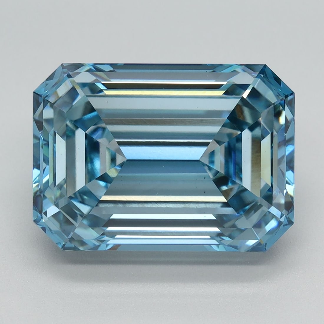 Loose Diamond - EMERALD 6.2ct Fancy Vivid Blue VS1: Loose Diamond - EMERALD 6.2ct Fancy Vivid Blue VS1 Source: This is a real non-mined Diamond that has been grown in a lab Shape: EMERALD Carats: 6.2 Color: Fancy Vivid Blue Certification: IGI Video: