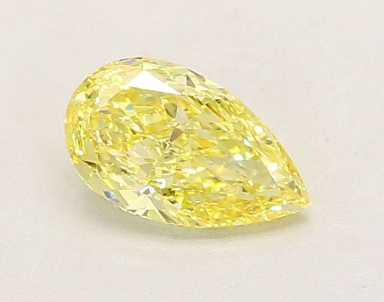 Loose Diamond - PEAR 0.97ct Fancy Intense Yellow VS1: Loose Diamond - PEAR 0.97ct Fancy Intense Yellow VS1 Source: This is a real non-mined Diamond that has been grown in a lab Shape: PEAR Carats: 0.97 Color: Fancy Intense Yellow Certification: IGI